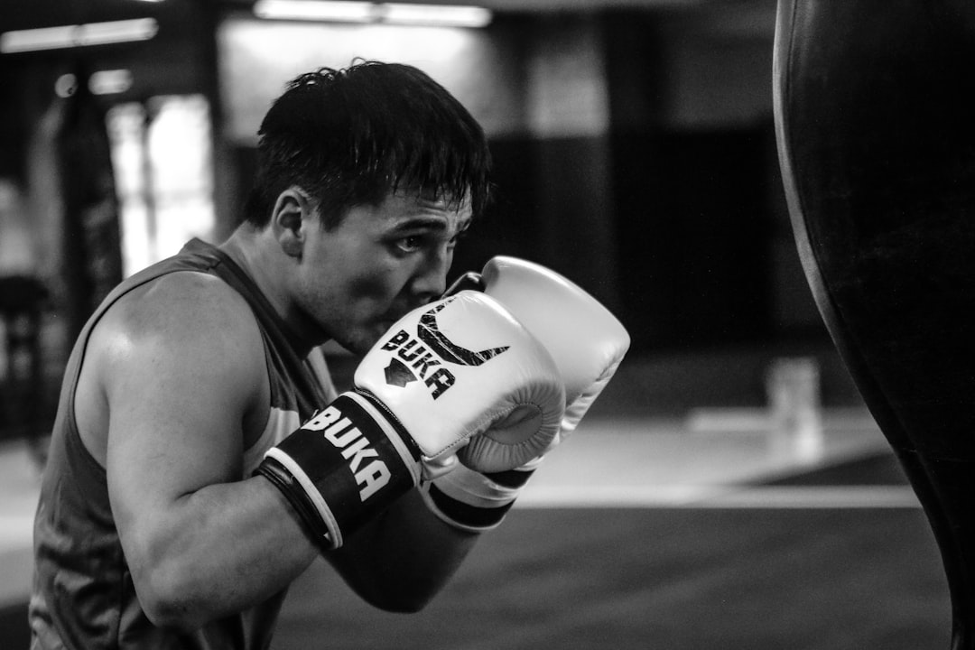 Boxer training with gloves at a boxing gym